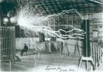 Nikola Tesla with Tesla Coil in his Colorado Springs Laboratory