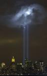 Tribute in Light: New York City, N.Y. (Sept. 9, 2004) - As the anniversary of the September 11, 2001 terrorist attack approaches, a test of the Tribute in Light Memorial illuminates a passing cloud above lower Manhattan. The twin towers of light, made-up of 44 searchlights
