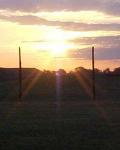 Sunrise at Woodhenge (Cahokia): Sunrise at Woodhenge (Cahokia, near Collinsville, IL). Photo Copyright Â© 2005 Elizabeth A. Kassly. http://www.naturealmanac.com/archive/cahokia/equinox.html